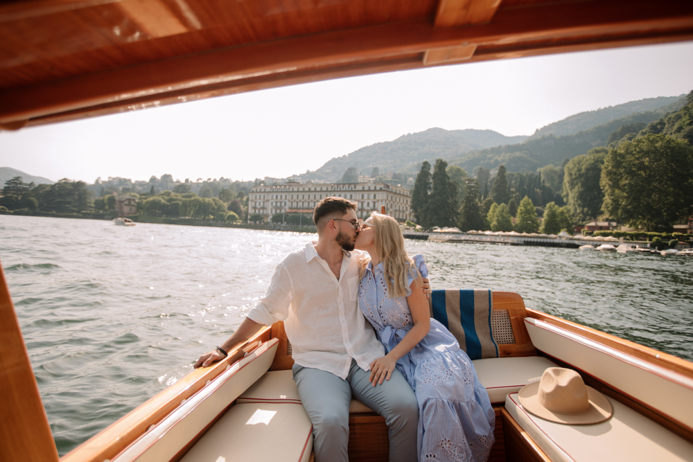 Romantic boat photoshoot on Lake Como after proposal
