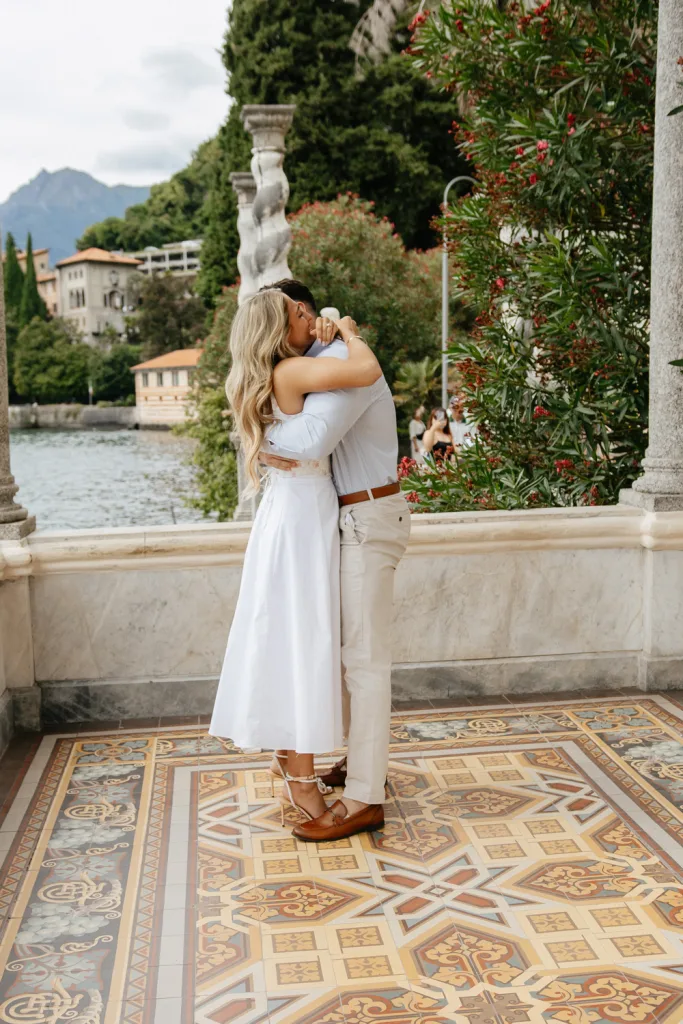 Romantic proposal on Lake Como balcony