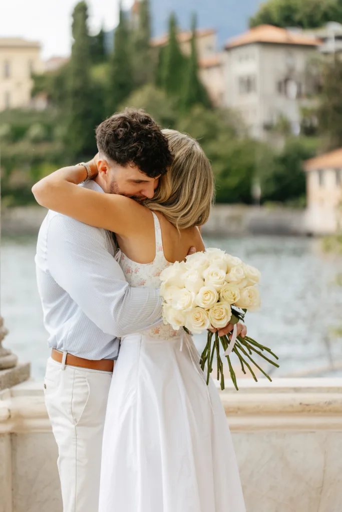 Romantic proposal on Lake Como balcony