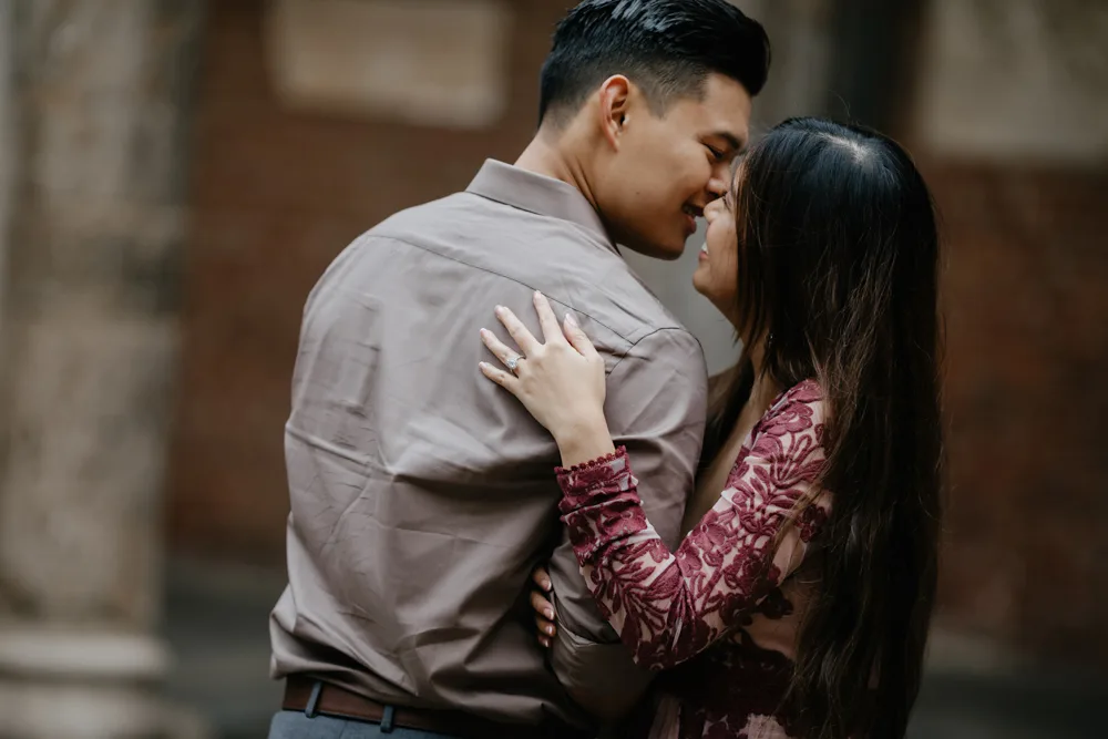 Couple posing in Milan city center for romantic destination photoshoot